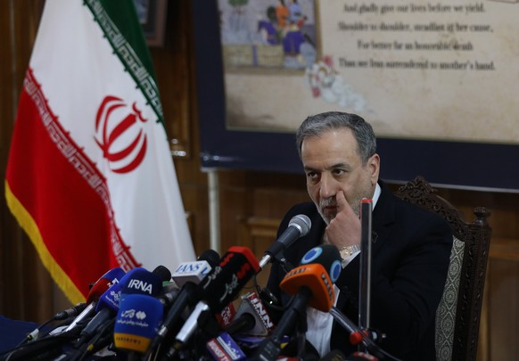 epa12960097 Iran's Foreign Minister Abbas Araghchi addresses a press conference after attending the BRICS Foreign Ministers' Meeting, at the Embassy of the Islamic Republic of Iran in New De ...