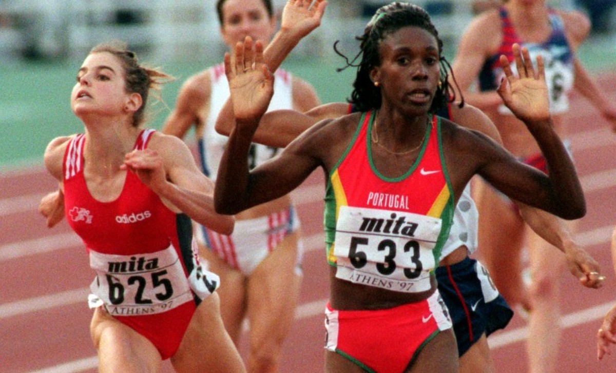 Carla Sacramento of Portugal crosses the finish line to win the gold medal in the final of the Women's 1500 meters at the World Track and Field Championships in Athens Tuesday August 5, 1997. At  ...