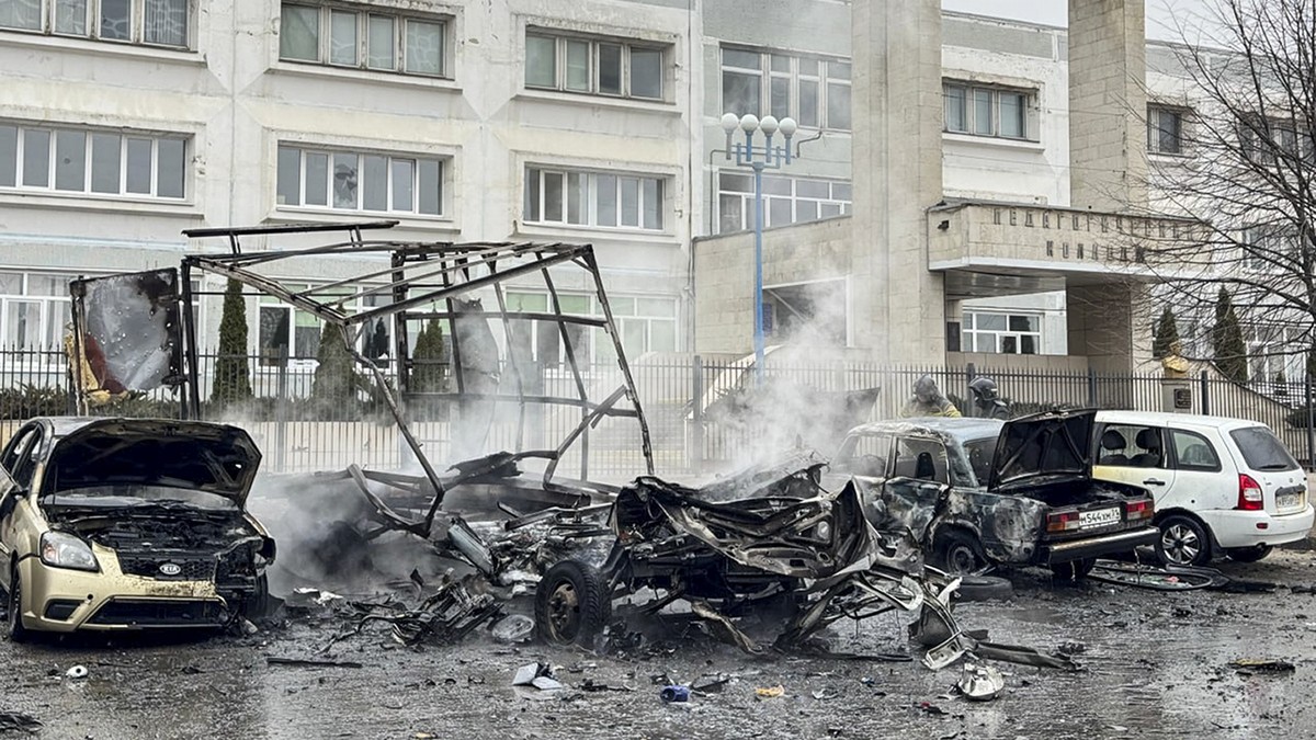 This photo released by Belgorod region governor Vyacheslav Gladkov's telegram channel on Saturday, March 16, 2024, shows broken and burned cars after shelling from the Ukrainian side, in Belgorod ...