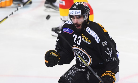 LuganoÃs player Giovanni Morini celebrates the 1-1 goal, during the fourth match of the semifinal of National League Swiss Championship 2017/18 between HC Lugano and EHC Bienne, at the ice stadium Re ...