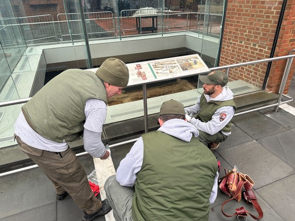 National Park Service employees reinstall parts of a slavery exhibit detailing the lives of nine people enslaved by President George Washington despite an ongoing legal fight between the city and the  ...