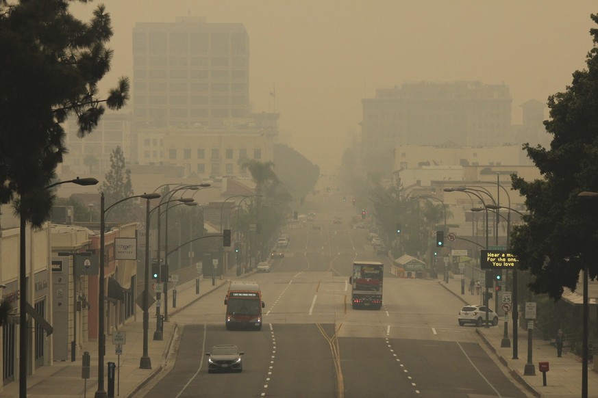 Smoke from wildfires fills the sky over Pasadena, Calif., in this view looking east down Colorado Boulevard on Saturday, Sept. 12, 2020. The air was categorized as unhealthy by the South Coast Air Qua ...