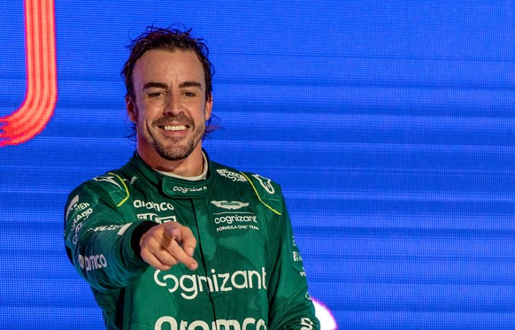 epa10532733 Third placed Spanish driver Fernando Alonso of Aston Martin during the podium ceremony for the Formula One Grand Prix of Saudi Arabia at the Jeddah Corniche Circuit, Saudi Arabia, 19 March ...