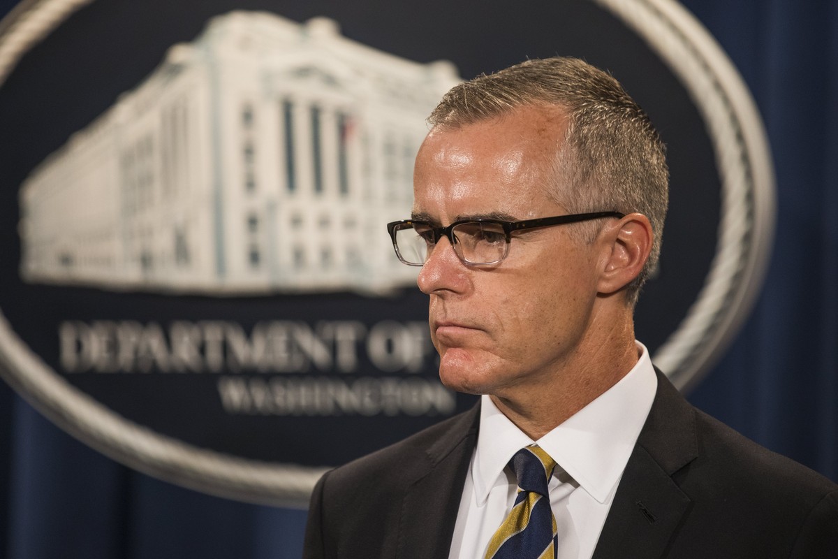 epa06484280 (FILE) Acting FBI Director Andrew McCabe, waits to speak at a press conference to announce the results from the Justice Department's annual national health care fraud takedown at the  ...