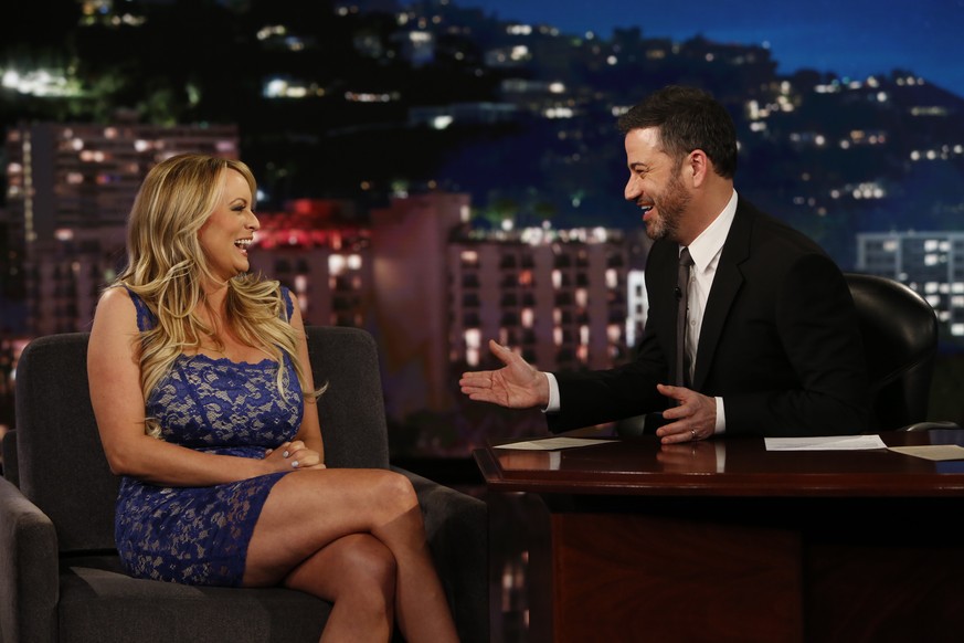 This image released by ABC shows adult film star Stormy Daniels, left, laughs with host Jimmy Kimmel during an appearance on &quot;Jimmy Kimmel Live!&quot; Tuesday, Jan. 30, 2018, in Los Angeles. (Ran ...