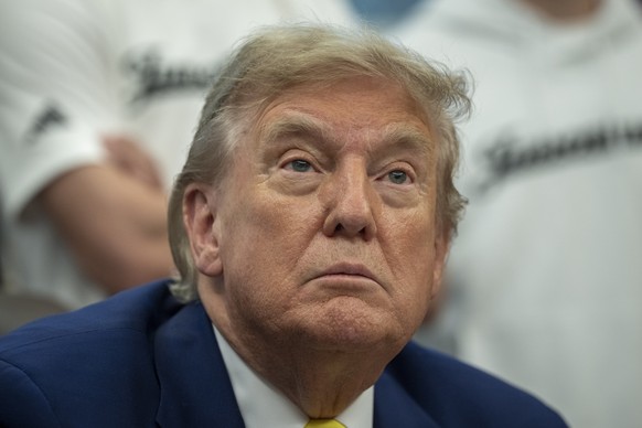 epa12184444 US President Donald Trump answers reporters questions during a meeting with members of the Juventus soccer club in the Oval Office of the White House in Washington, DC, USA, 18 June 2025.  ...