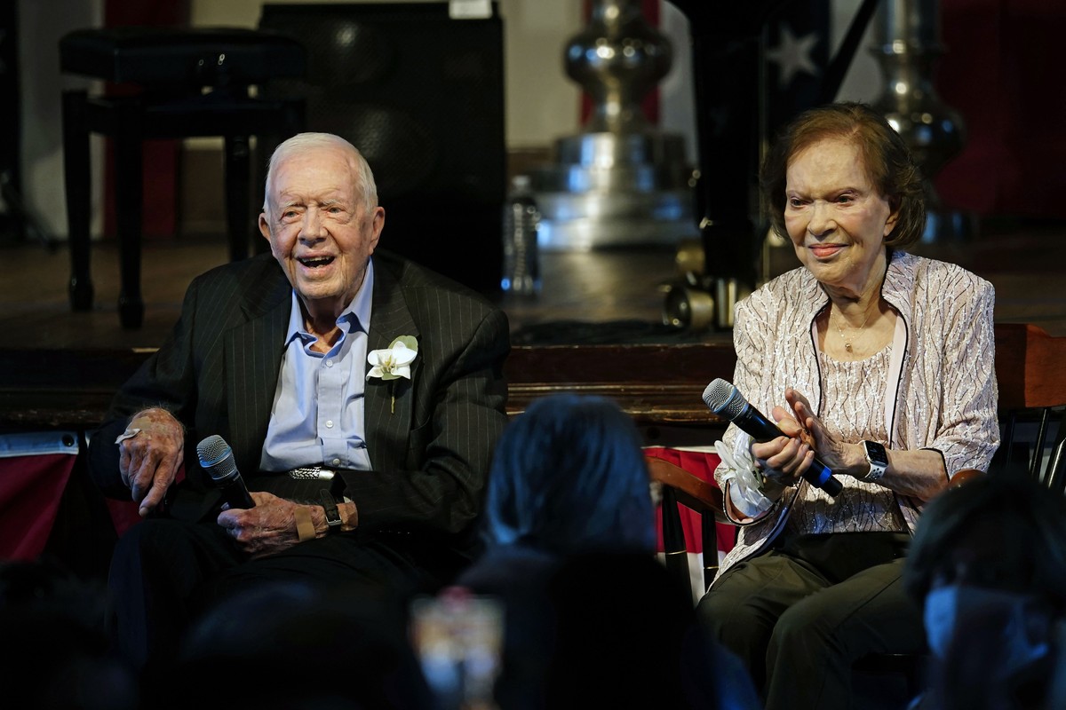 FILE - Former President Jimmy Carter and his wife former first lady Rosalynn Carter sit together during a reception to celebrate their 75th wedding anniversary Saturday, July 10, 2021, in Plains, Ga.  ...