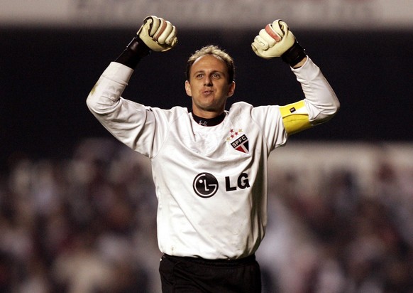 Rogerio Ceni, goalkeeper of Brazil&#039;s Sao Paulo FC, celebrates his teams third goal against Mexico&#039;s Chivas during a Copa Libertadores semifinal soccer match at the Morumbi stadium in Sao Pau ...