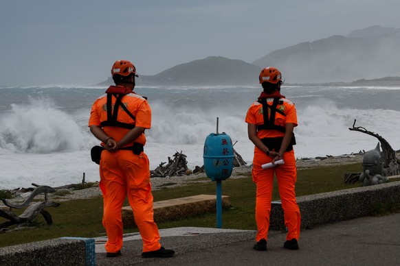 epa13101939 Taiwanese coast guard personnel patrol at the coastal area as huge waves brought by Typhoon Bavi hit the shore in Hualien city, Taiwan, 10 July 2026. The Central Weather Administration (CW ...