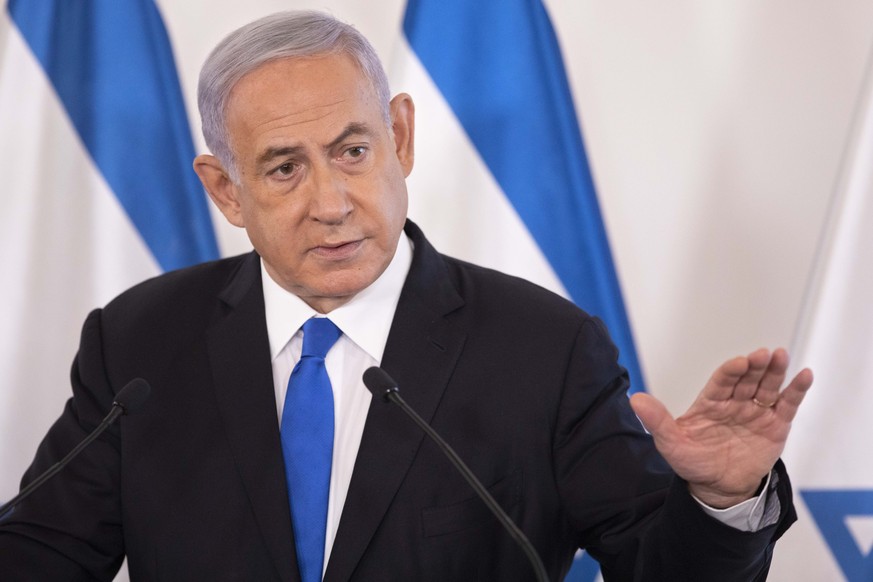 Israeli Prime Minister Benjamin Netanyahu gestures as he speaks during a briefing to ambassadors to Israel at the Hakirya military base in Tel Aviv, Israel, Wednesday, May 19, 2021. (AP Photo/Sebastia ...