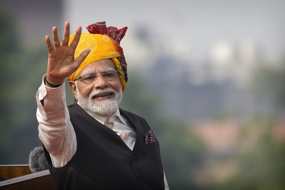 Indian Prime Minister Narendra Modi waves after delivering his speech at the 17th century Mughal-era Red Fort monument on the country's Independence Day in New Delhi, India, Tuesday, August 15, 2023. Modi p...