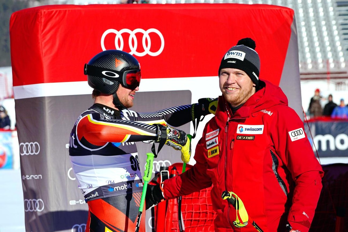 epa09800727 Cameron Alexander (L) of Canada and Niels Hintermann (R) of Switzerland react in the finish area during the men's Downhill race of the FIS Alpine Skiing World Cup in Kvitfjell, Norway ...