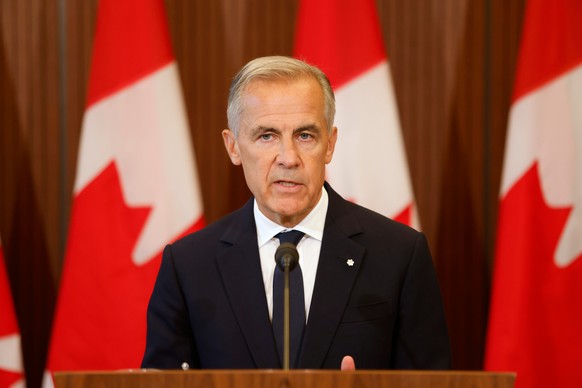 Prime Minister Mark Carney speaks about Canada's response to new U.S. tariffs during a news conference on Parliament Hill in Ottawa on Saturday, Aug. 22, 2026. (Patrick Doyle/The Canadian Press v ...