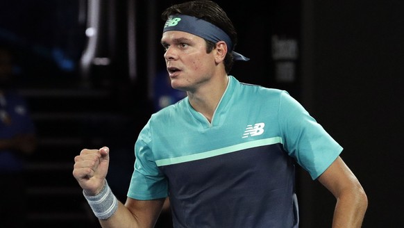 Canada&#039;s Milos Raonic reacts after winning a point against Switzerland&#039;s Stan Wawrinka during their second round match at the Australian Open tennis championships in Melbourne, Australia, Th ...