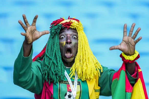 A supporter from Cameroon reacts prior the start the World Cup group G soccer match between Switzerland and Cameroon, at the Al Janoub Stadium in Al Wakrah, Qatar, Thursday, Nov. 24, 2022. (AP Photo/P ...