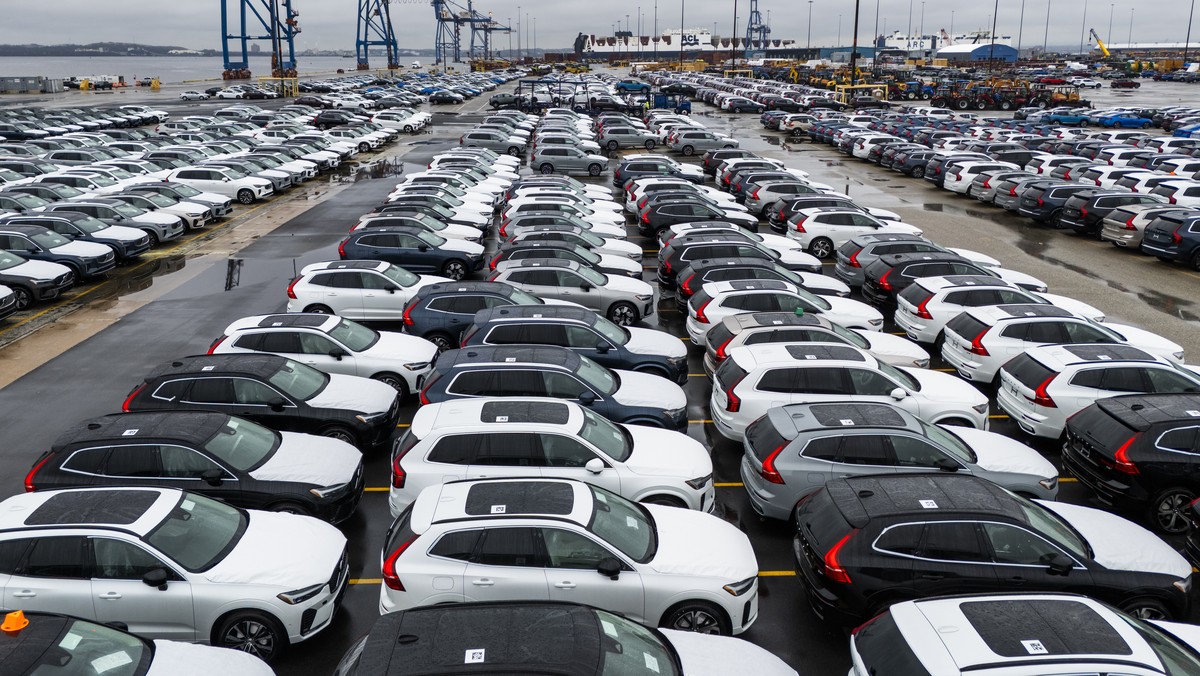 epa12016609 An image taken with a drone shows new Volvo automobiles awaiting transport from the Dundalk Marine Terminal in Baltimore, Maryland, USA, 07 April 2025. In an attempt to bolster US auto pro ...
