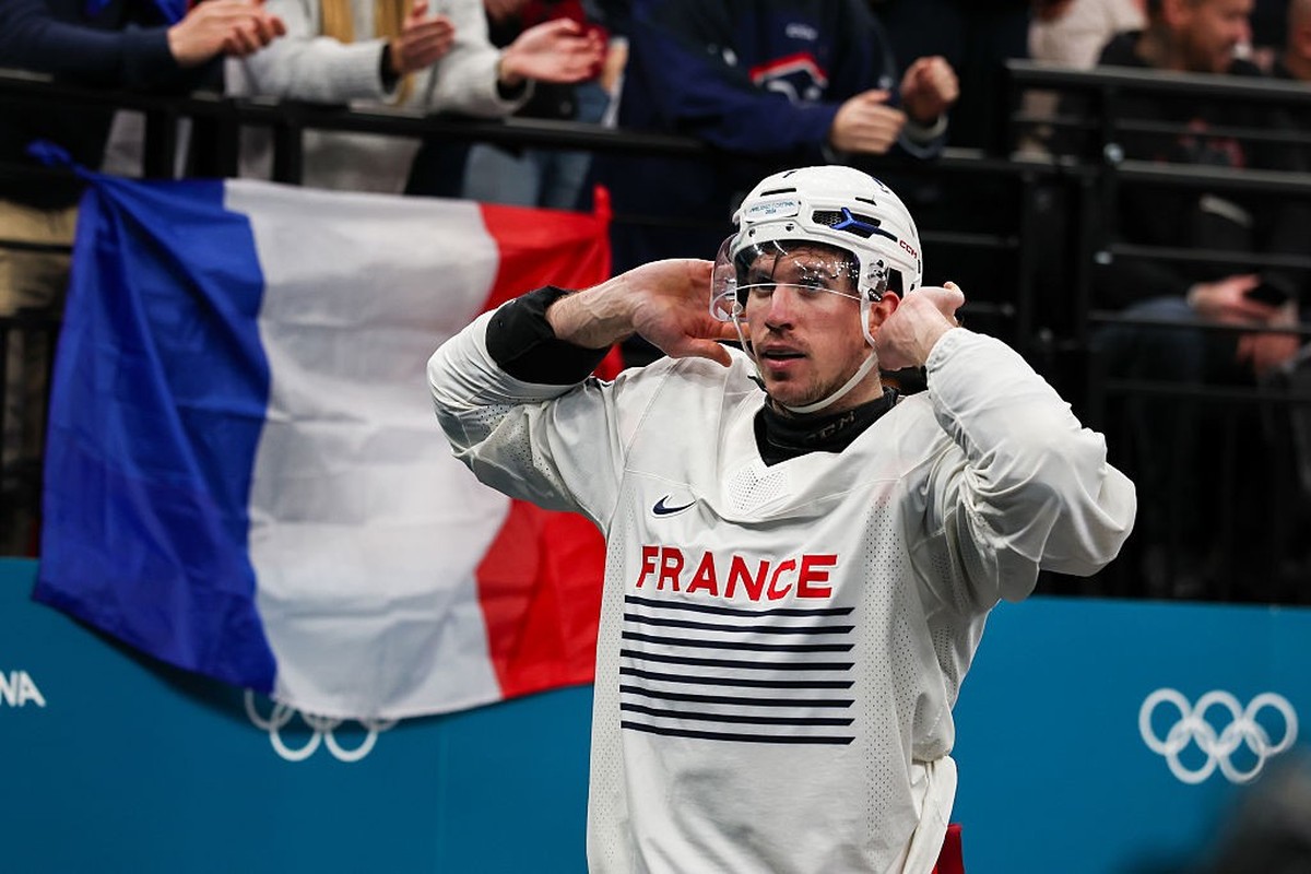 MILAN, ITALY - FEBRUARY 15: Pierre Crinon #7 of Team France reacts as he gets ejected during the Men's Preliminary Group A match between Canada and France on day nine of the Milano Cortina 2026 W ...