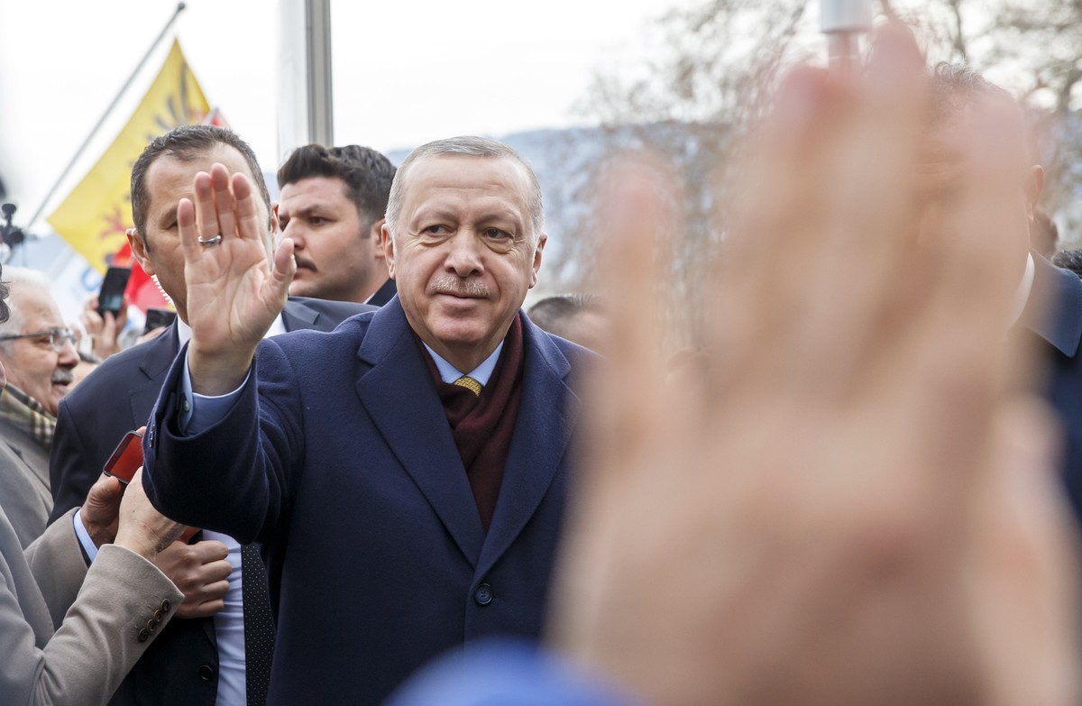 Turkey's President Recep Tayyip Erdogan greats people when arriving at his hotel one day before the opening UNHCR - Global Refugee Forum in Geneva, Switzerland, Monday, Dec. 16, 2019. (Salvatore  ...