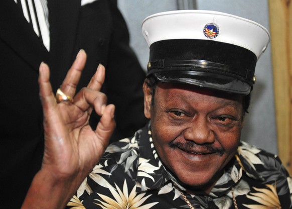 FILE - In this Nov. 5, 2008 file photo, Fats Domino waves to fans before a ceremony re-presenting two Grammy awards to replace the ones that he lost from Hurricane Katrina&#039;s flooding in New Orlea ...