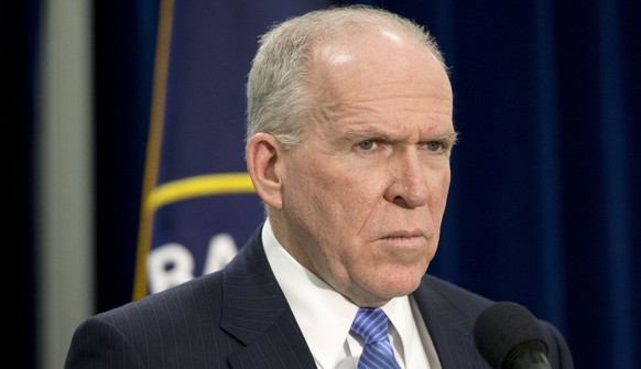 FILE - In this Dec. 11, 2014 fie photo, CIA Director John Brennan listens during a news conference at CIA headquarters in Langley, Va. An anonymous hacker claims to have breached CIA Director John Bre ...