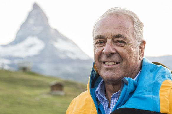 Former Swiss Federal Councillor Adolf Ogi, poses in front of the Matterhorn in the background, after the premiere of the theater &quot;The Matterhorn Story&quot; which is based on the story of the fir ...