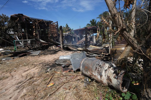 A damaged house is seen after what Thai soldiers said was a Cambodian artillery strike in the area in Sisaket province, Thailand, Sunday, Dec. 14, 2025. (AP Photo/Sakchai Lalit)
Thailand Cambodia