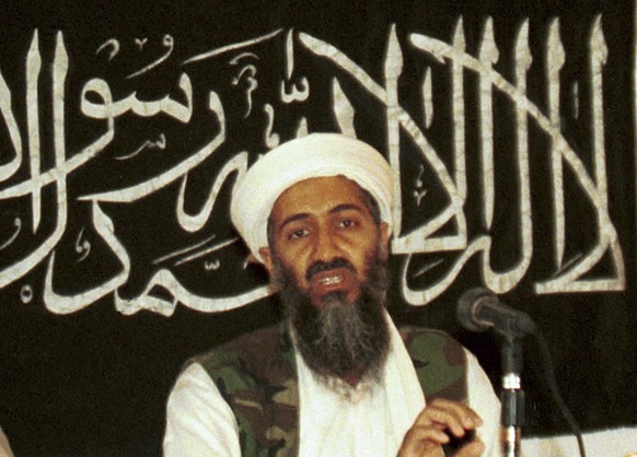 FILE - In this 1998 file photo made available on March 19, 2004, Osama bin Laden is seen at a news conference in Khost, Afghanistan. After 20 years America is ending its �??forever�?� war in Afghanist ...