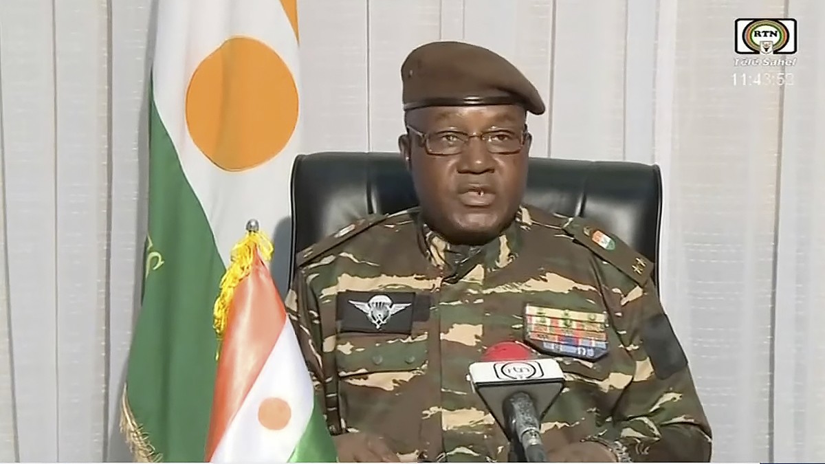 In this image taken from video provided by ORTN, Gen. Abdourahmane Tchiani makes a statement Friday, July 28, 2023, in Niamey, Niger. Niger state television identified him as the leader of the Nationa ...