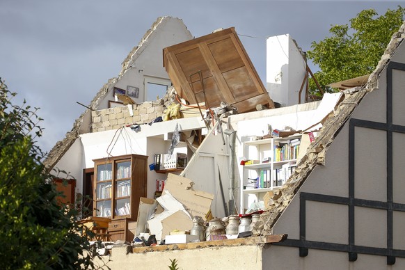 epa07765493 A view of a damaged house after a tornado hit the town of Petange, Luxembourg, 10 August 2019. According to meteorologists, a tornado caused considerable damage in Petange and Bascharage o ...
