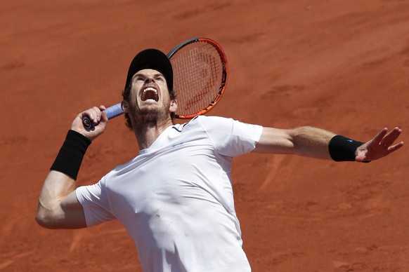 FILE - In this June 9, 2017, file photo, Britain&#039;s Andy Murray serves against Switzerland&#039;s Stan Wawrinka during their semifinal match of the French Open tennis tournament at Roland Garros s ...