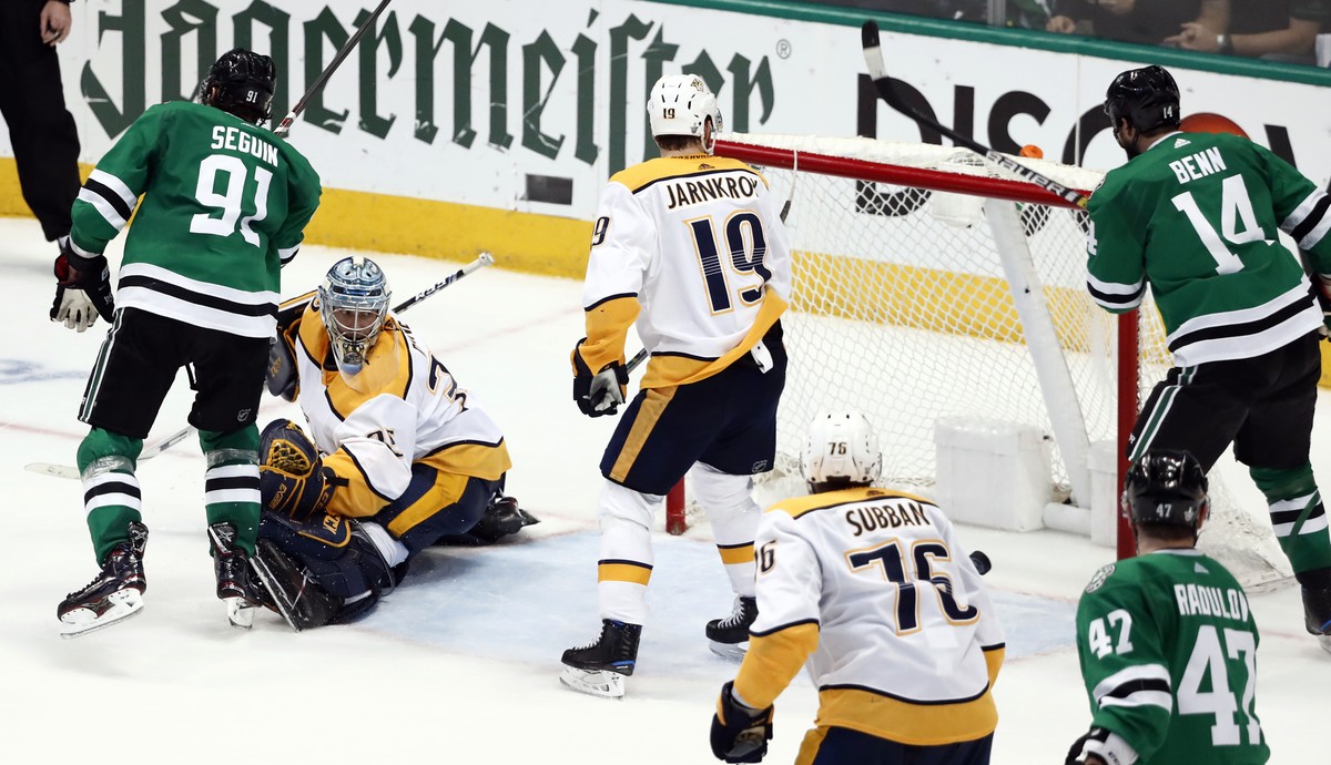 Dallas Stars' Tyler Seguin (91), Nashville Predators goaltender Pekka Rinne, Calle Jarnkrok (19), P.K. Subban (76), the Stars' Alexander Radulov (47) and Jamie Benn (14) watch as the puck fa ...