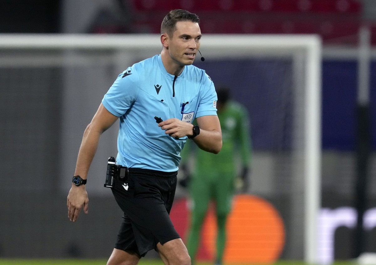 Referee Sandro Schaerer during the UEFA Champions League soccer match between RB Leipzig and Manchester City in Leipzig, Germany, Tuesday, Dec. 7, 2021. (AP Photo/Michael Sohn)