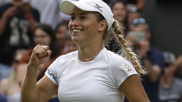 Kazakstan&#039;s Yulia Putintseva celebrates after beating Japan&#039;s Naomi Osaka in a Women&#039;s singles match during day one of the Wimbledon Tennis Championships in London, Monday, July 1, 2019 ...