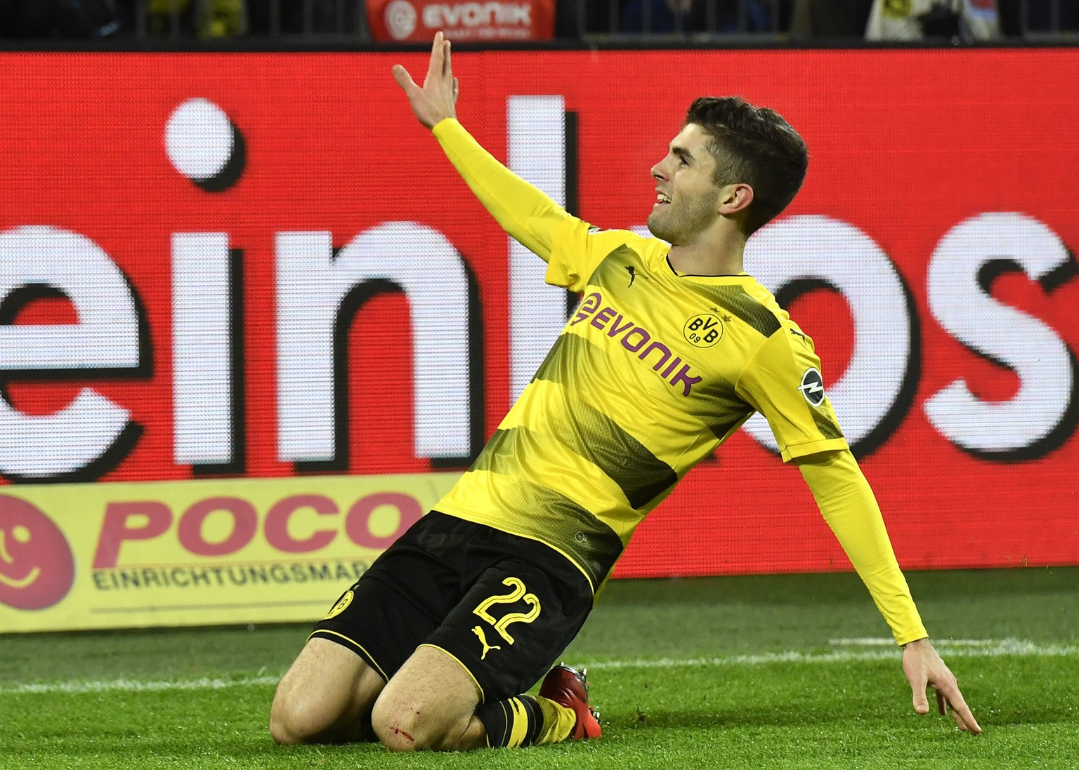 Dortmund&#039;s Christian Pulisic celebrates after he scored his side&#039;s second goal during the German Bundesliga soccer match between Borussia Dortmund and TSG Hoffenheim in Dortmund, Germany, Sa ...