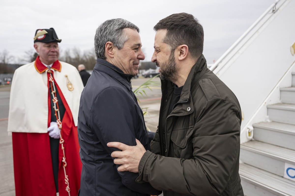 Switzerland's Foreign Minister Federal Councillor Ignazio Cassis, center, welcomes Volodymyr Zelenskyy, President of Ukraine, on Monday, January 15, 2024 on the Airport of Zurich Kloten, Switzerl ...