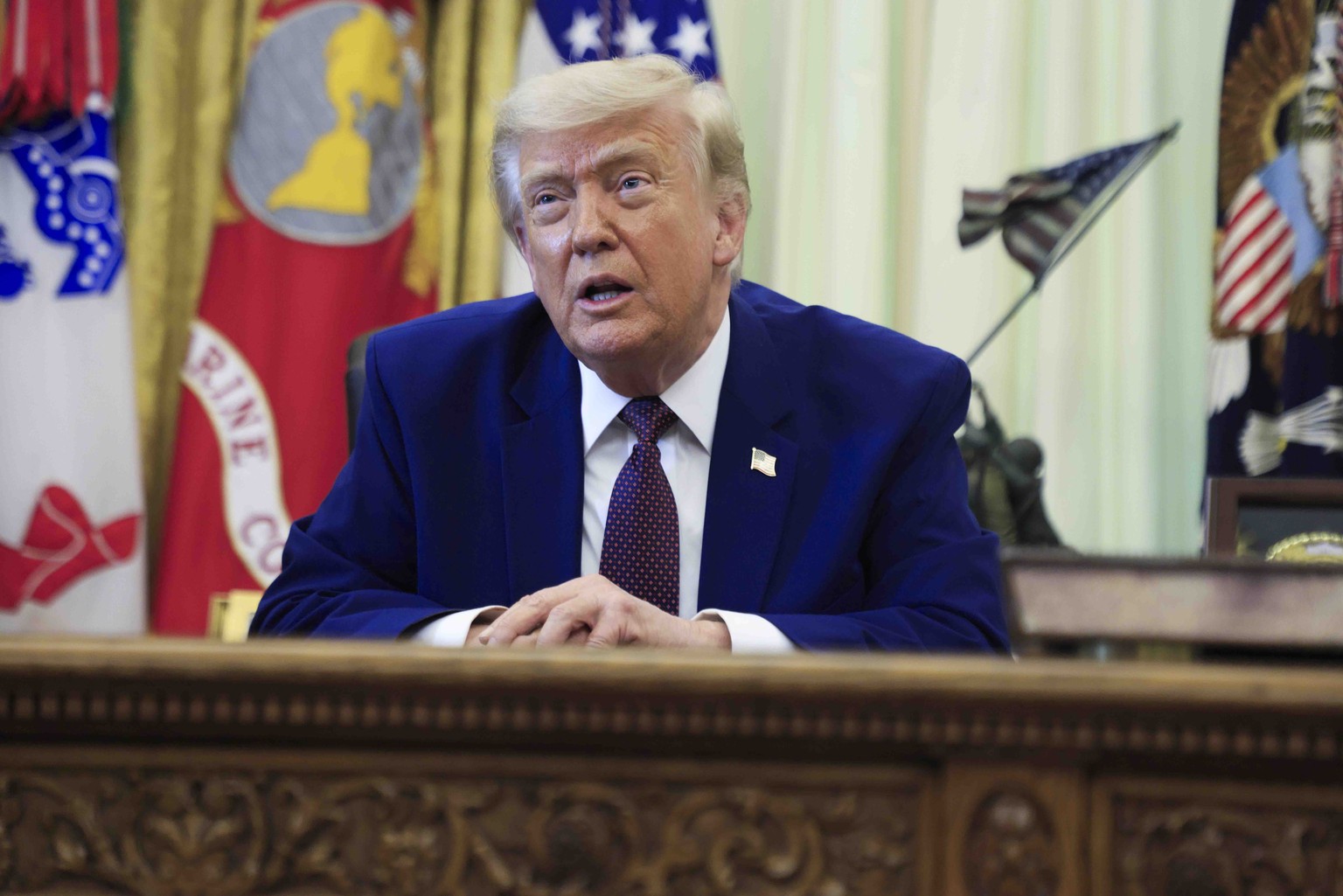 epa13014163 US President Donald J. Trump responds to a question from the news media during an executive order signing ceremony in the Oval Office of the White House in Washington, DC, USA, 03 June 202 ...