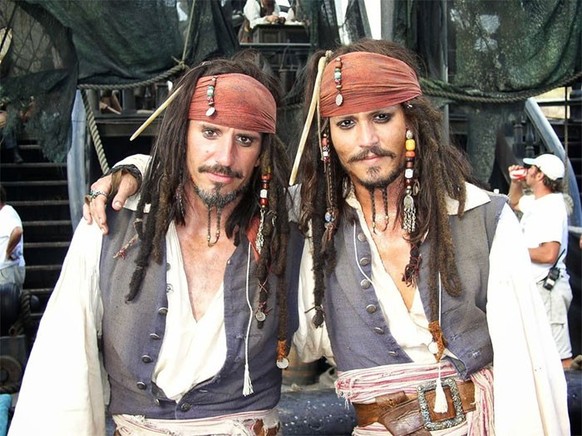 Johnny Depp With His Stunt Double Tony Angelotti On The Set Of Pirates Of The Caribbean

https://www.reddit.com/r/pics/comments/3o953q/captain_jack_and_his_stunt_double_tony_angelotti/