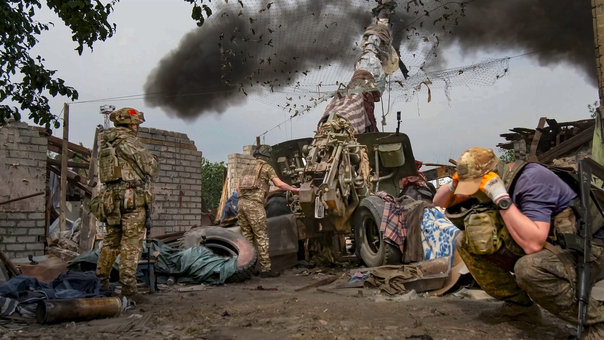 In this photo released by the Russian Defense Ministry Press Service on Tuesday, June 25, 2024, Russian soldiers fire the 152-mm howitzer "Msta-B" in an undisclosed location in Ukraine. (Rus ...