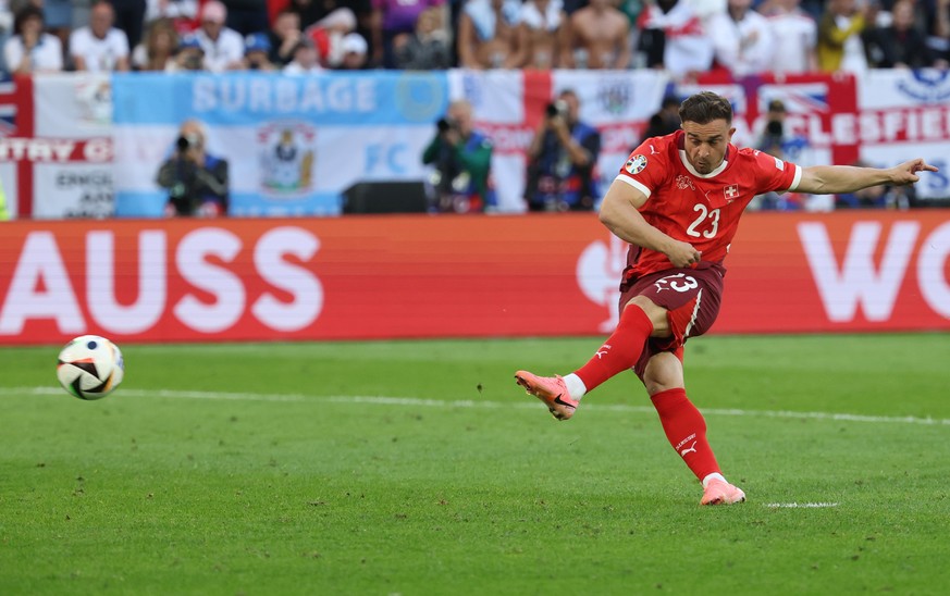 epa11463325 Xherdan Shaqiri of Switzerland converts his team&#039;s third penalty during penalty shoot-out of the UEFA EURO 2024 quarter-finals soccer match between England and Switzerland, in Dusseld ...