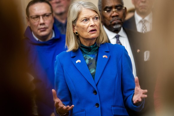 epa12653973 US Senator Lisa Murkowski speaks at a press conference after a meeting between members of the Danish Parliament, a Greenlandic committee, and US Congress members at Christiansborg. Copenha ...