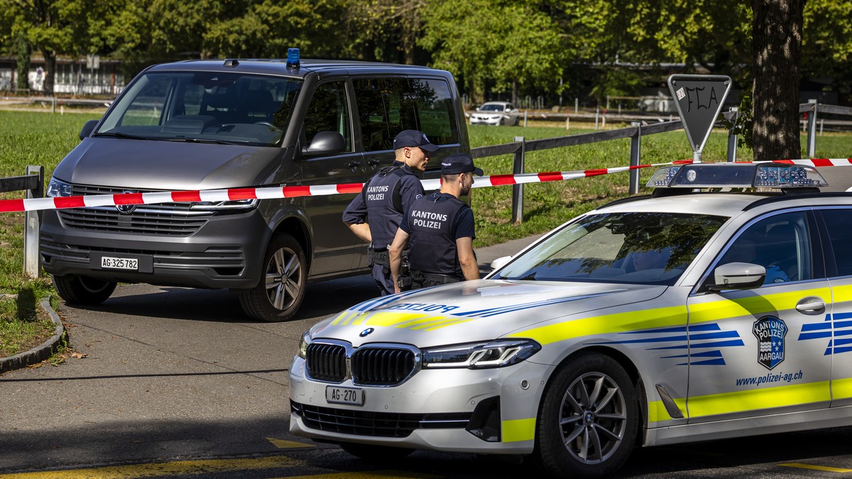 Police forces secure the area around the Schachen horse racing track following a shooting during a rave event at the Schachen horse racing track in Aarau, Switzerland on Sunday, August 30, 2026. Accor ...