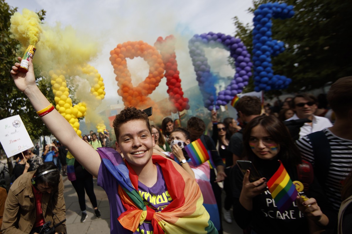 epa07910133 Participants attend Kosovo's third Pride Parade in Pristina, Kosovo, 10 October 2019. Hundreds of participants marched through the main square of the capital city, demanding freedom a ...