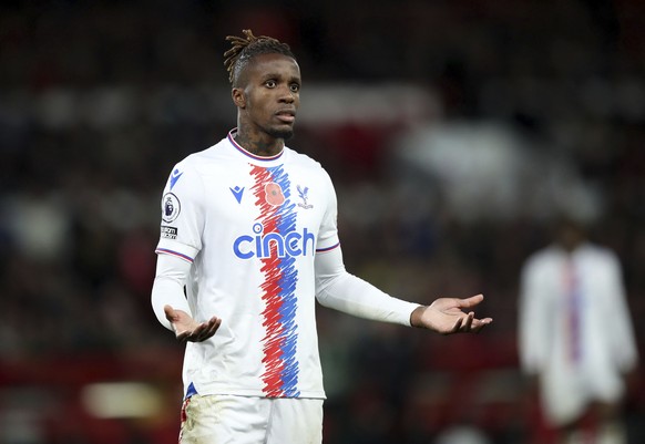 Crystal Palace&#039;s Wilfried Zaha stands dejected during the Premier League match between Nottingham Forest and Crystal Palace at City Ground in Nottingham, England, Saturday Nov. 12, 2022. (Isaac P ...