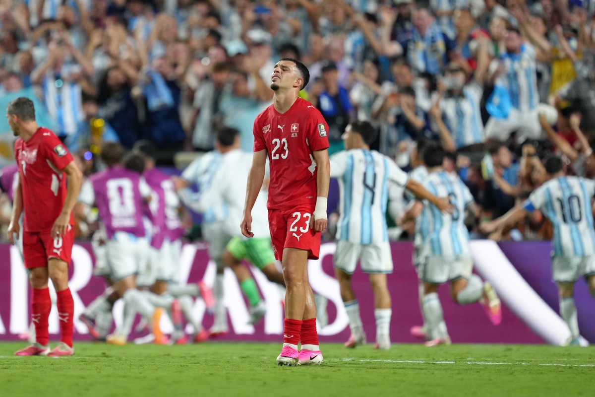 Switzerland's Zeki Amdouni (23) reacts after Argentina's seance goal during the World Cup quarterfinal soccer match between Argentina and Switzerland in Kansas City, Mo., Saturday, July 11,  ...