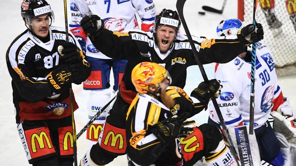 From left Lugano’s player Dario Bürgler, Lugano’s player Tony Martensson and Lugano’s player Linus Klasen celebrate 1-0 goal during the second leg of the Playoffs quarterfinals game of National League ...