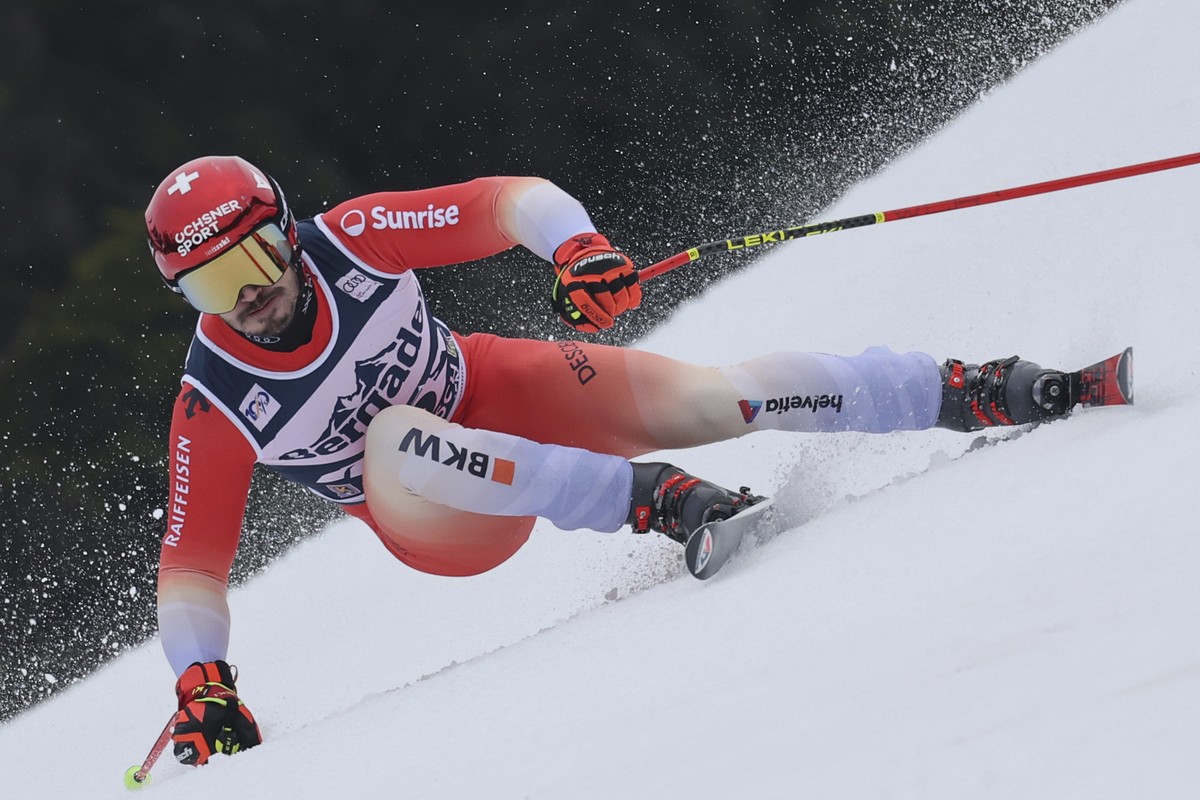 Switzerland's Loic Meillard speeds down the course during an alpine ski, men's World Cup super G race, in Garmisch-Partenkirchen, Germany, Saturday, Jan. 27, 2024. (AP Photo/Marco Trovati)