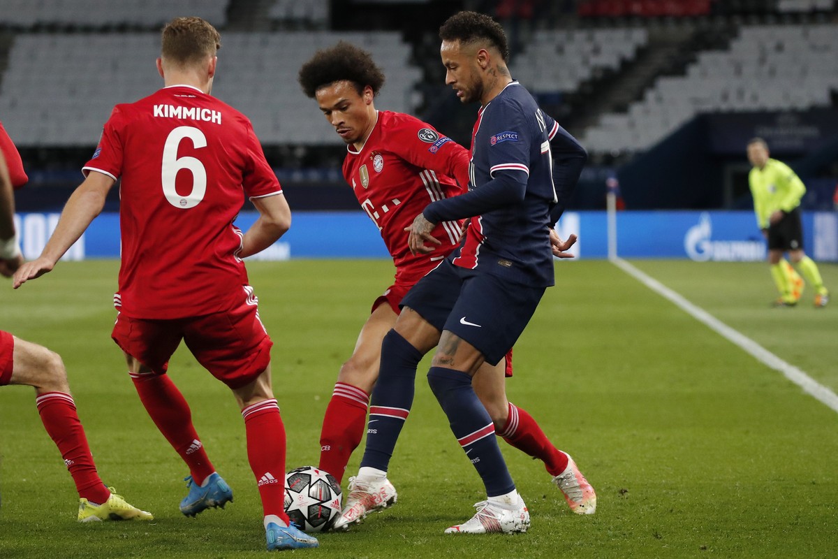 PSG's Neymar, right, challenges for the ball with Bayern's Leroy Sane, center, and Bayern's Joshua Kimmich, left, during the Champions League, second leg, quarterfinal soccer match betw ...
