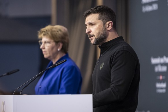 Swiss Federal President Viola Amherd, left, and Ukrainian President Volodymyr Zelenskyy hold a media briefing during the Summit on peace in Ukraine, in Stansstad near Lucerne, Switzerland, Saturday, J ...