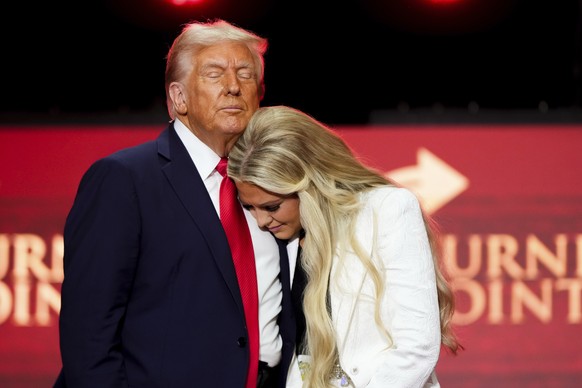 KEYPIX - President Donald Trump hugs Erika Kirk at the conclusion of a memorial for her husband, conservative activist Charlie Kirk, Sunday, Sept. 21, 2025, at State Farm Stadium in Glendale, Ariz. (K ...