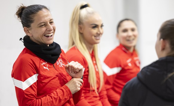 Switzerland&#039;s Fabienne Humm, Alisha Lehmann, Sandrine Mauron, and Noelle Maritz, left to right, attend an activation session before a training session on the training ground Tahuna Park in Dunedi ...